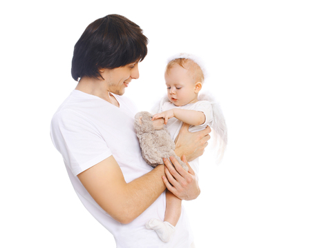 Happy young father with baby on a white backgroundの写真素材