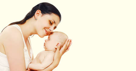 Baby sleeping on mother's hands on white background, blank copy space for advertising text