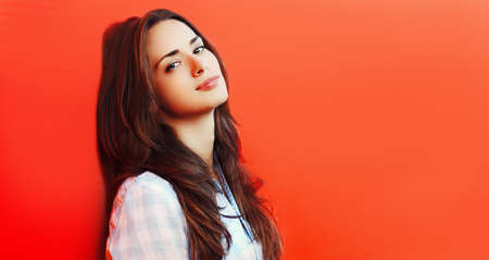 Summer portrait of beautiful young brunette woman in the cityの写真素材