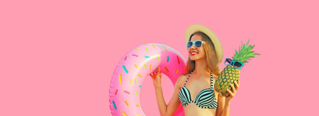 Summer vacation, tourism, happy smiling young woman with swimming inflatable ring and pineapple...
