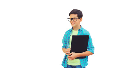 Portrait of schoolboy in eyeglasses with folder or book isolated on white backgroundの写真素材