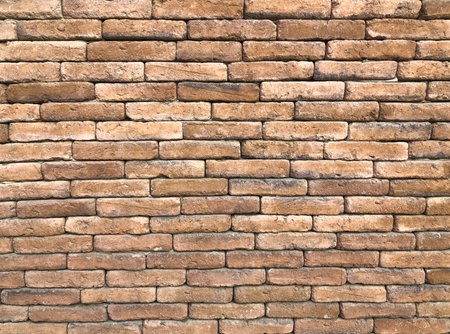 Grungy old brown brick wall texture background for abstract pattern, design cover