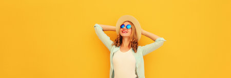 Happy caucasian relaxed young woman enjoying sunny warm day wearing summer straw hat, sunglasses...