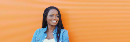 Portrait of happy confident smiling young african woman, successful black girl looking away standing...
