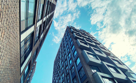 Architecture and real estate, residential apartment building with large panoramic windows, modern complex backgroundの写真素材