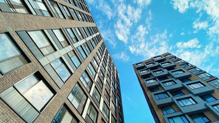 Architecture and real estate, residential apartment building with large panoramic windows, modern complex backgroundの写真素材