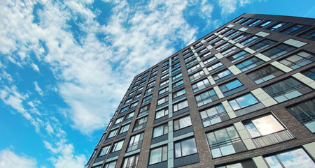 Architecture and real estate, residential apartment building with large panoramic windows, modern complex backgroundの写真素材