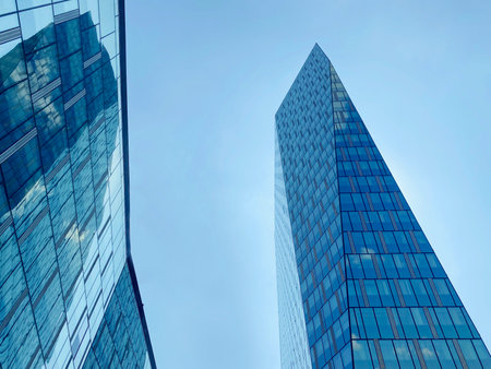 Office building. Skyscrapers in business center. Modern architecture, glass curved facade of...