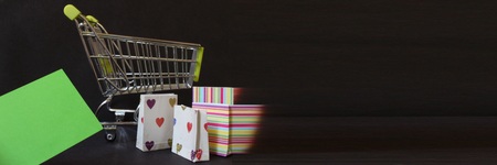 shopping cart and bags with debit card for online shoppingの写真素材