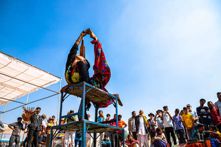 reflection of camel in water,they are coming here to drink water and blue sky is in the background.のeditorial素材
