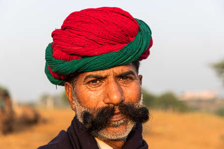 portrait of man with red turban,faces of rajasthan.のeditorial素材
