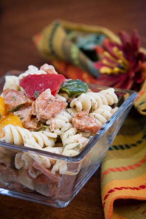 Seafood salad - Smoked Salmon Pasta with red and yellow bell peppers, celery and creamy mayonnaise.の写真素材