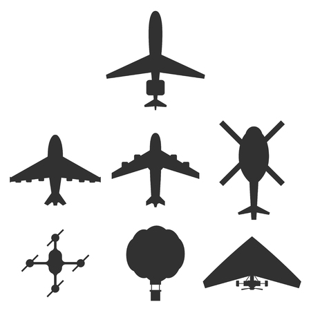 Airplane, helicopter, drone, air balloon and hang-glider icons set. Black vector silhouette top view isolated on a white background.のイラスト素材