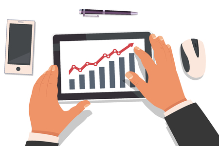 Businessman hands holding a tablet and working with a graph of market analysis statistics. Top view vector flat illustration of a workplace with gadgets.のイラスト素材