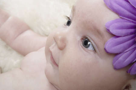 Closeup of a young baby's faceの写真素材