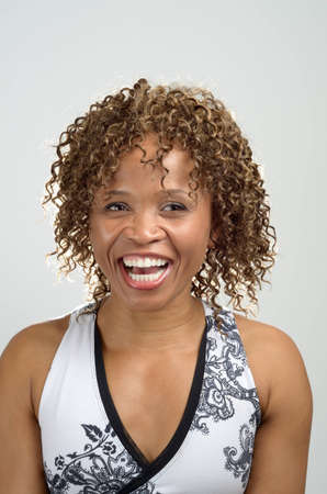 Head shot of a woman laughingの写真素材