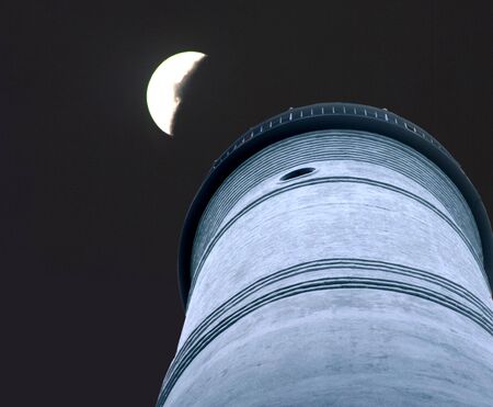 looking up the side of the key west lighthouse at nightの写真素材