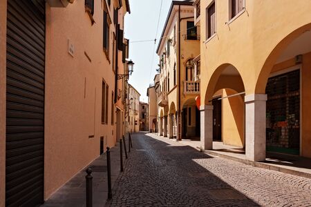 Corner of yellow building with street light on piazza Capitaniato in Padua Italyのeditorial素材