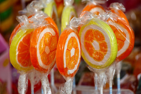 Colored sweet candys, lollipops sticksの写真素材
