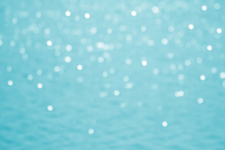 <p>Blue gold abstract lights. Festive glitter blur Bokeh background. Defocused backdrop. Abstract...