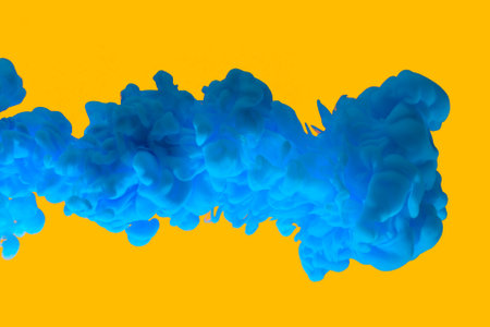 <p>Blue paint clouds in water isolated on solid yellow background. Acrylic colors and ink in water. Abstract background. Isolated. Bright colorful art. Copy space for banner, poster design. Ukraine&nbsp;</p>の写真素材