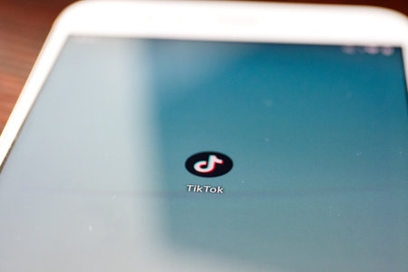 TikTok application on mobile phone. TikTok is a Chinese video-sharing social networking service...