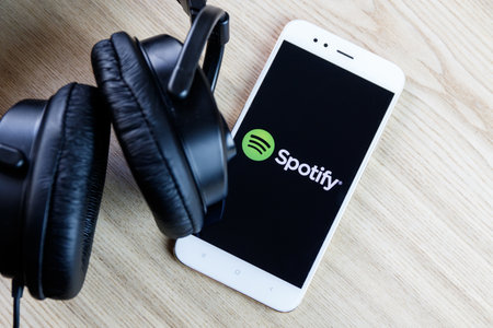 Mobile music application Spotify. Spotify is a Swedish music streaming and media services provider. Business is providing an audio streaming platform.のeditorial素材