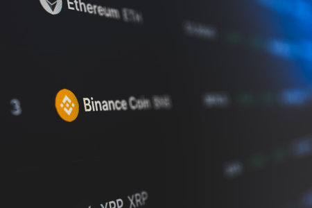 Binance coin on cryptocurrency exchange market . A cryptocurrency is a digital or virtual currency that uses cryptography for securityのeditorial素材
