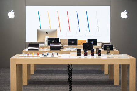 Apple authorized shop. The modern shop with apple products: Iphone, Macbook, Ipad, Apple logo.のeditorial素材
