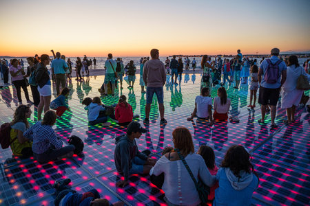 The famous Zadar city monument - The greeting of the sun where people watch beautiful sunset over the seaのeditorial素材