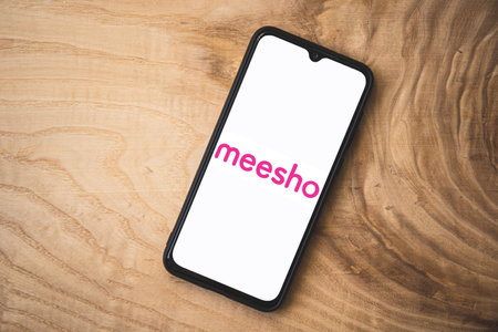 Meesho application on smartphone. Top angle shot. Meesho is an indian social e-commerce companyのeditorial素材