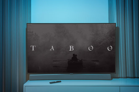 Taboo TV series on big tv screen. Taboo television show at homeのeditorial素材