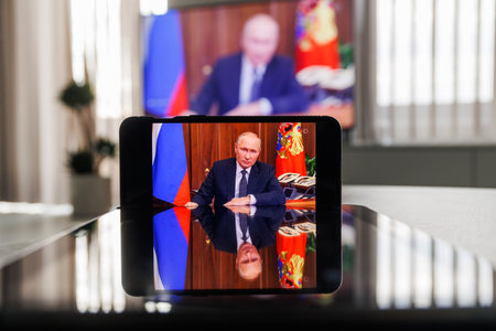 Moscow, Russia - 2022, September 26: Message on TV from Russian President Vladimir Putin. War in Ukraine. Nuclear weapon threatのeditorial素材