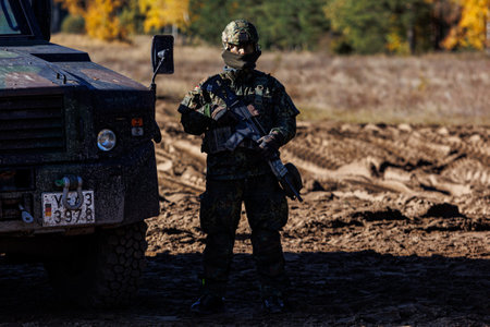Rukla, Lithuania - 2022 October 10: Germany Nato soldiers with full soldier equipment. The North...