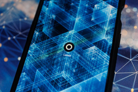 Lensa application on smartphone. Lensa app uses AI to make magic avatarsのeditorial素材