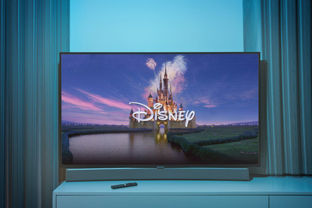 The Disney intro logo on TV. The Walt Disney Company, commonly known as Disney, is an American multinational, mass mediaのeditorial素材