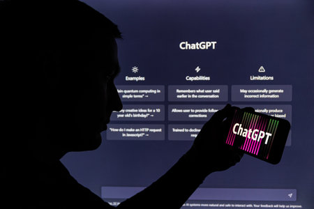 Man silhouette holding smartphone with ChatGPT . ChatGPT is AI chatbot which is made by OpenAIのeditorial素材