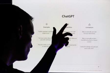 Man silhouette points on ChatGPT screen . ChatGPT is AI chatbot which is made by OpenAIのeditorial素材
