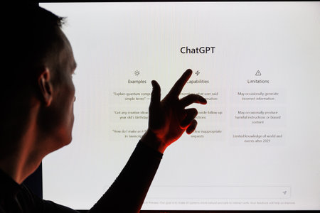 Man silhouette points on ChatGPT screen . ChatGPT is AI chatbot which is made by OpenAIのeditorial素材