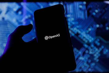 ChatGPT OpenAI on smartphone in conceptual Artificial intelligence futuristic backgroundのeditorial素材