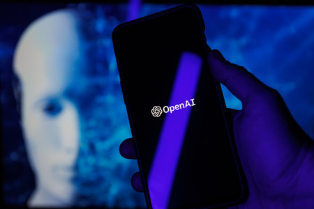 ChatGPT OpenAI on smartphone in conceptual Artificial intelligence futuristic backgroundのeditorial素材