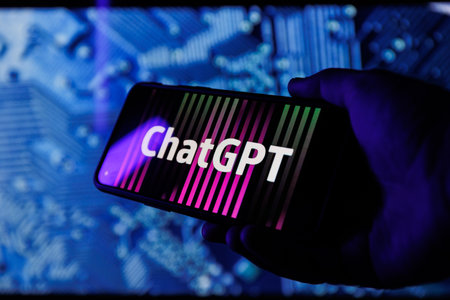 ChatGPT OpenAI on smartphone in conceptual Artificial intelligence futuristic backgroundのeditorial素材