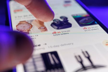 Paris, France - 2023 February 16: Aliexpress app on smartphone screen. Close up shot of aliexpress appのeditorial素材