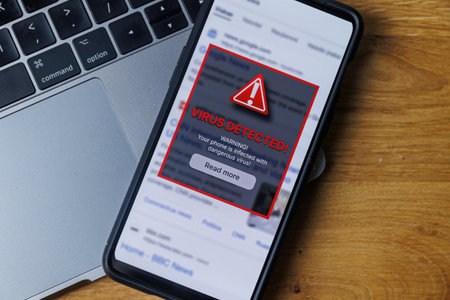 Virus warning notification on phone screen. Dangerous malware virus in phone Conceptの写真素材