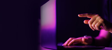 Close-up shot of Man typing on laptop with text free space on the side. Business, computer, coding, e-commerce concept High quality big resolution photo. High quality photoの写真素材