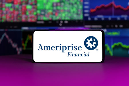 Ameriprise financial on stock market index in front of stock market charts backgroundのeditorial素材