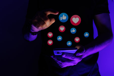 Man scrolling through social network and consumed by Social Media's Validation and Approval. High...