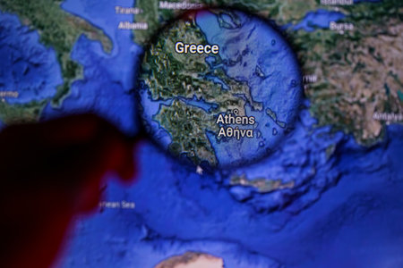 Greece trough magnifying glass on map. High quality photoの写真素材