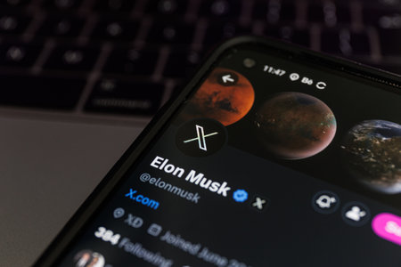 Twitter changes name to X. Elon Musk twitter account.のeditorial素材
