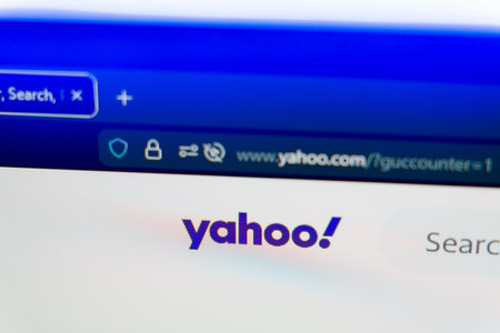 Yahoo homepage displayed on a computer screen with the official logo, search bar, and secure browser address bar, representing global news, web search services, and digital media portal.のeditorial素材